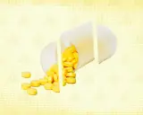 A white pill bottle is cut into pieces, spilling yellow pills onto a yellow background with warning symbols.